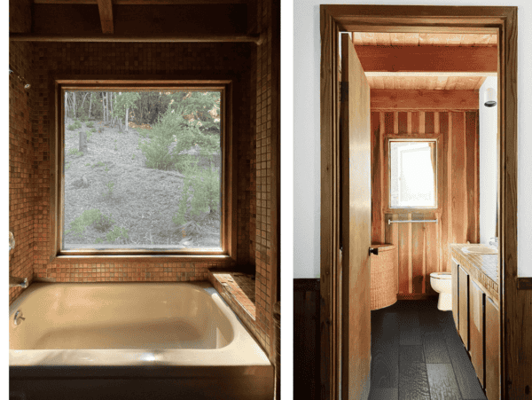 Bathtub and bathroom with wood accents.